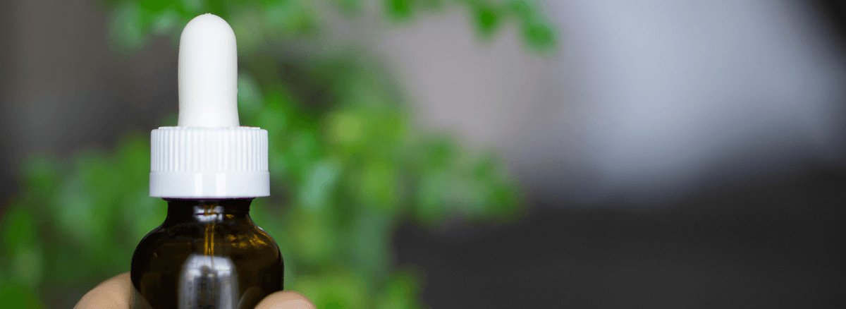 Scientist showing vaccine vial